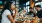 a group of people eating at a restaurant