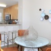 a dining room with a table and chairs